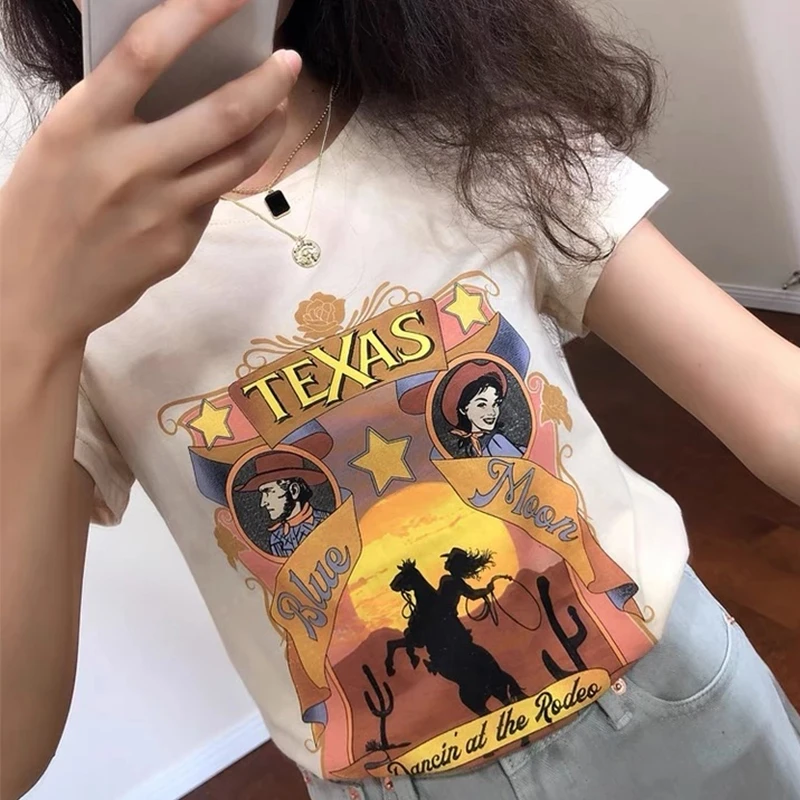 Женская футболка с рисунком Cowgirl в стиле ретро, белая хлопковая футболка с коротким рукавом, Техасская эстетика, Свободные повседневные фут...
Женская футболка с рисунком Cowgirl в стиле ретро, белая хлопковая футболка с коротким рукавом, Техасская эстетика, Свободные повседневные фут...