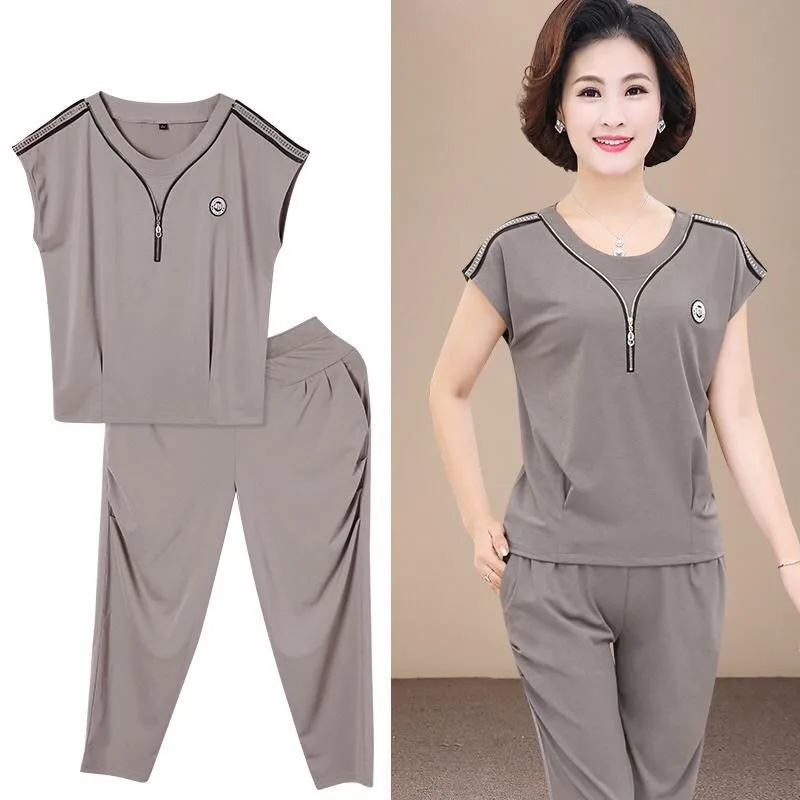2021 New Summer Thin T-shirt Casual Pants Women Set Fashion Large Size Loose Comfortable Two Piece Set Middle-aged Mother Lu1930
2021 New Summer Thin T-shirt Casual Pants Women Set Fashion Large Size Loose Comfortable Two Piece Set Middle-aged Mother Lu1930