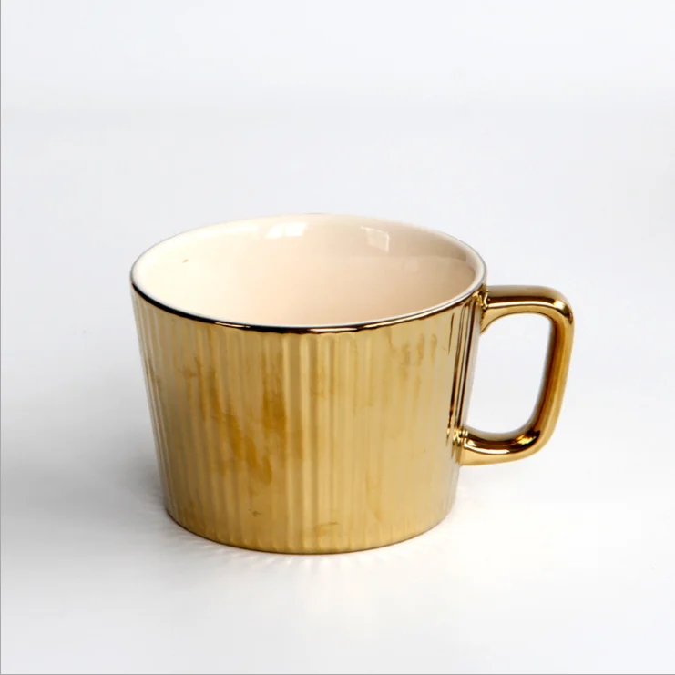 European golden ceramic cup high-end hotel cup ion gold-plated Nordic style mug cup
European golden ceramic cup high-end hotel cup ion gold-plated Nordic style mug cup