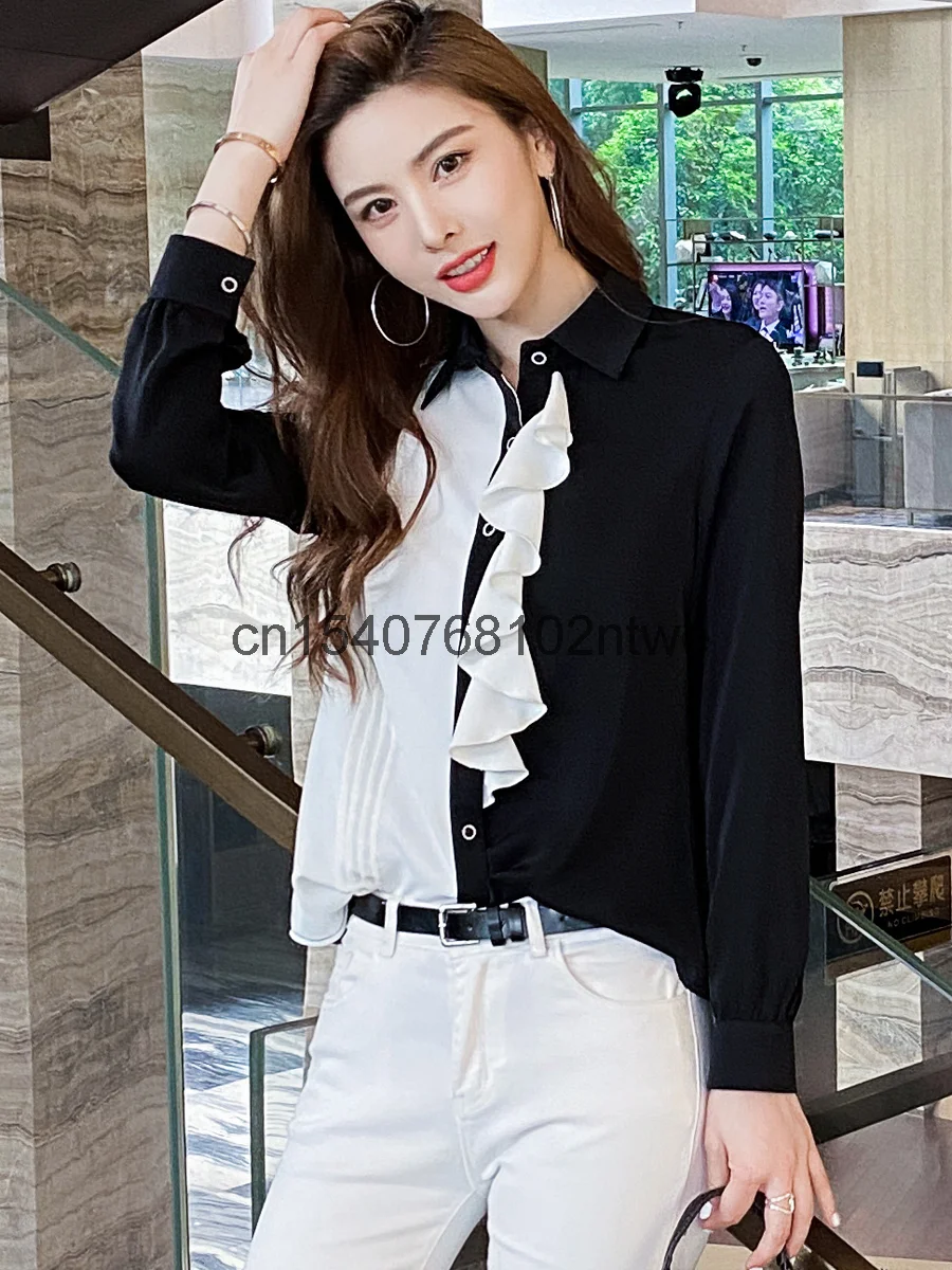 Exquisite black and white color matching long sleeve shirt women's 2021 summer new color contrast eye-catching Ruffle blouse 
Exquisite black and white color matching long sleeve shirt women's 2021 summer new color contrast eye-catching Ruffle blouse