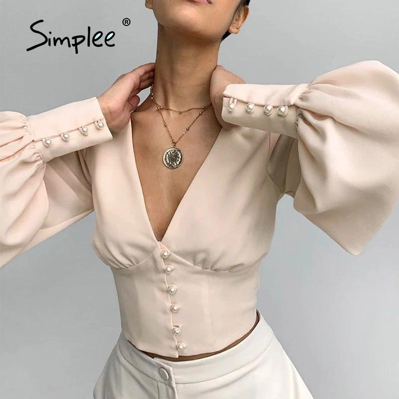 Simplee Elegant v-neck peal women's blouse autumn High street puff long sleeve blouse shirt Fashion button female crop tops 2021
Simplee Elegant v-neck peal women's blouse autumn High street puff long sleeve blouse shirt Fashion button female crop tops 2021