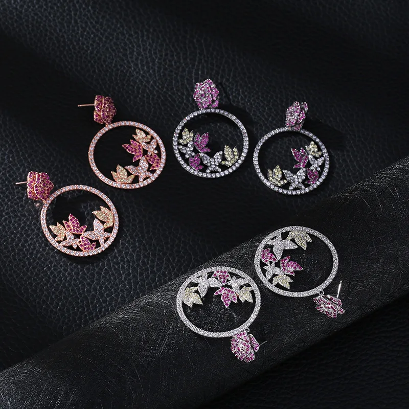 Colorful plum blossom zircon earrings Hollow micro-inlaid butterfly earrings Colorful personalized earrings Exaggerated and gorg 
Colorful plum blossom zircon earrings Hollow micro-inlaid butterfly earrings Colorful personalized earrings Exaggerated and gorg
