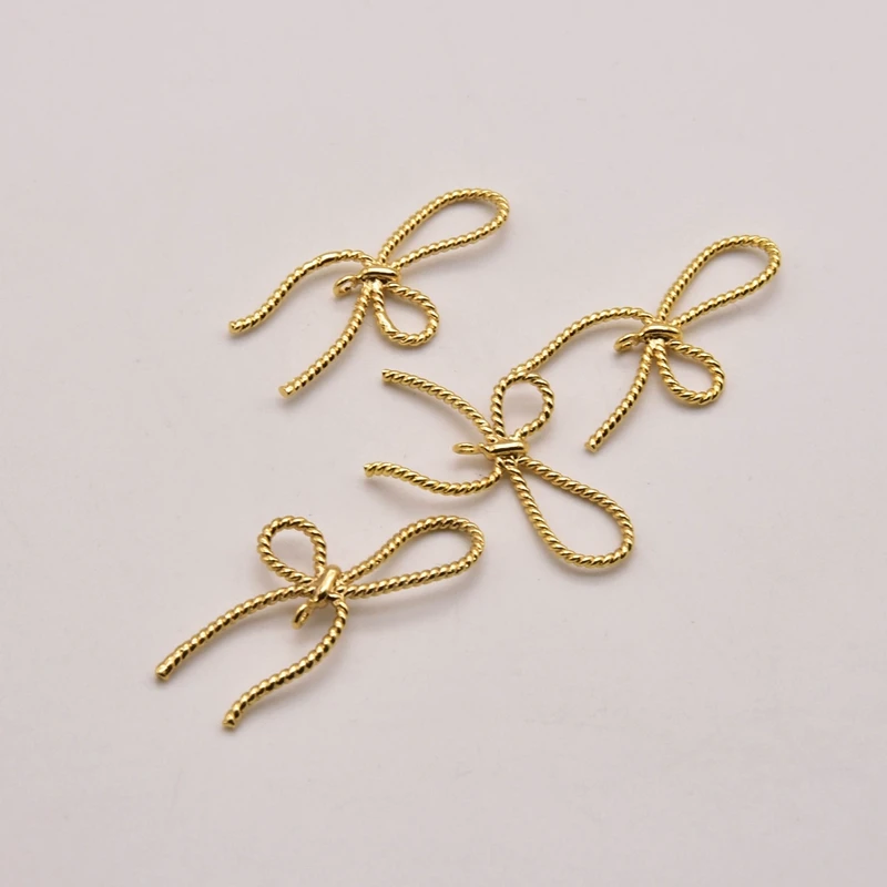 10 Pcs/Lot 29mm*15mm Hollow Bow Pendant 18K Brass Gold Plated Jewelry Accessory Pendants Jewelry Making Wholesale JA0330
10 Pcs/Lot 29mm*15mm Hollow Bow Pendant 18K Brass Gold Plated Jewelry Accessory Pendants Jewelry Making Wholesale JA0330