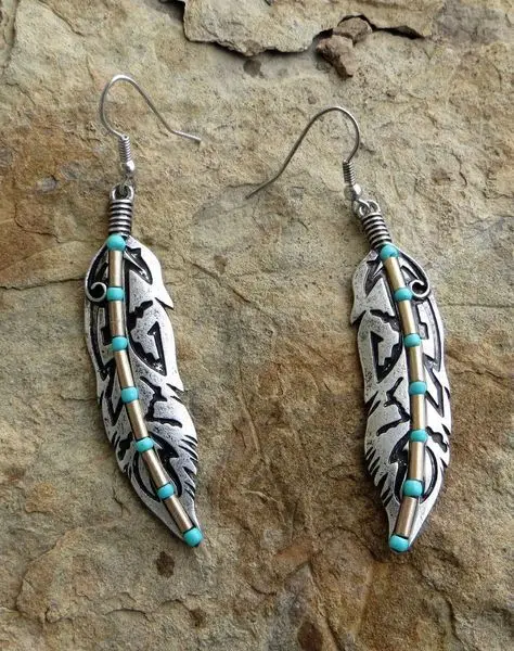 European and American court vintage turquoise feather earrings bohemian style silver plated Thai silver earrings ladies jewelry 
European and American court vintage turquoise feather earrings bohemian style silver plated Thai silver earrings ladies jewelry