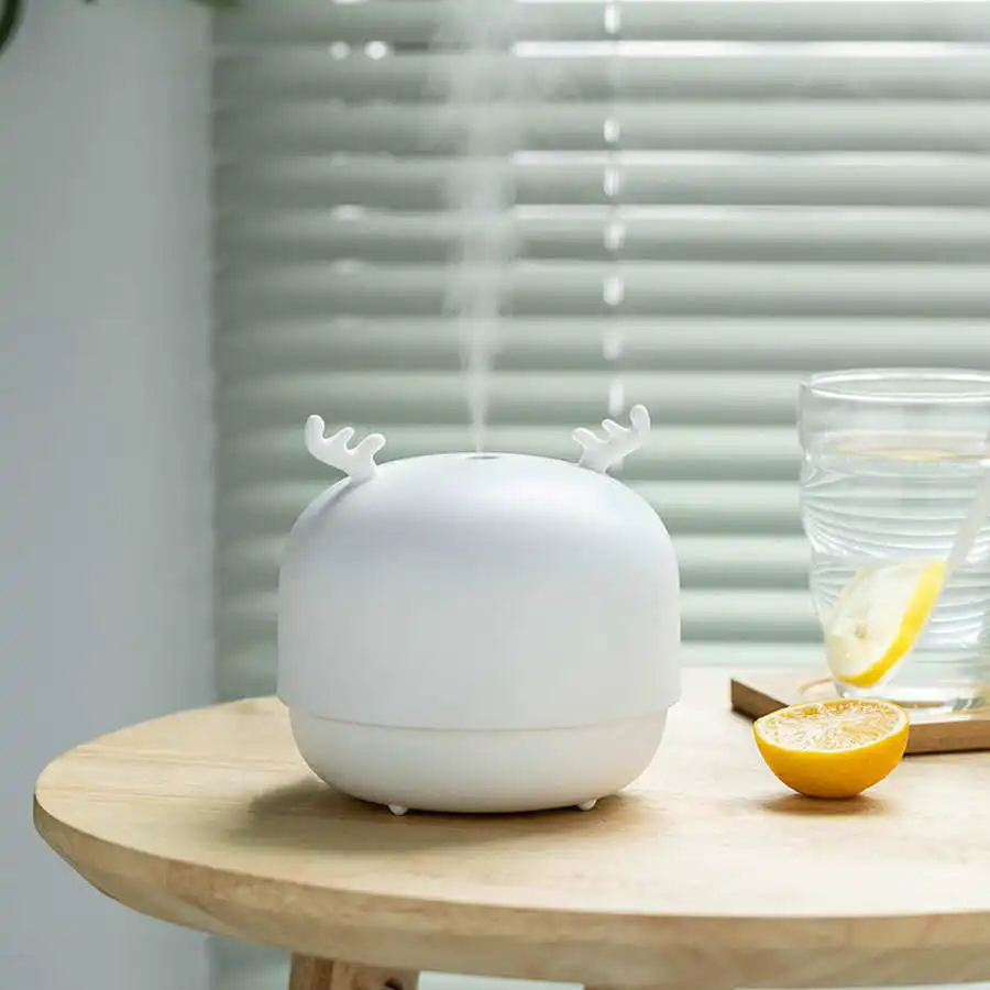 USB Air Humidifier Mini Cute Deer Essential Aroma Oil Diffuser Home Humidification Mist Maker Atomizer with LED Night
USB Air Humidifier Mini Cute Deer Essential Aroma Oil Diffuser Home Humidification Mist Maker Atomizer with LED Night