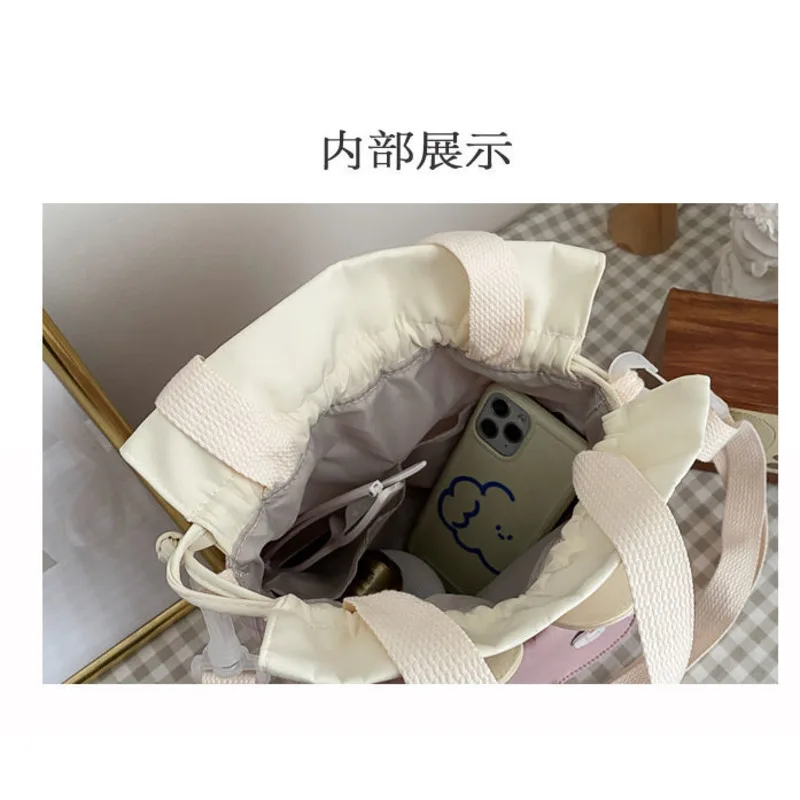 White Blush Bear Cuten Canvas Bucket Bag Women's 2021 New Small Fresh Shoulder Bag Versatile Student Lattice Messenger Bag
White Blush Bear Cuten Canvas Bucket Bag Women's 2021 New Small Fresh Shoulder Bag Versatile Student Lattice Messenger Bag