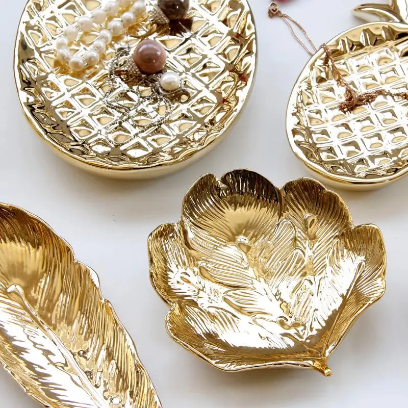 European Storage Tray Gold Leaf Ceramic Plate Dish Candy Trinket Jewelry Fruit Serving Tray Storage Plate Crockery Tableware New
European Storage Tray Gold Leaf Ceramic Plate Dish Candy Trinket Jewelry Fruit Serving Tray Storage Plate Crockery Tableware New
