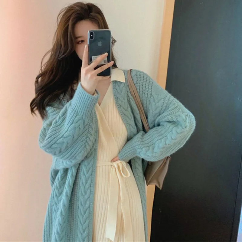 Medium length cardigan sweater women's autumn 2021 new loose coat lazy style sweater winter long sleeve knitwear 
Medium length cardigan sweater women's autumn 2021 new loose coat lazy style sweater winter long sleeve knitwear