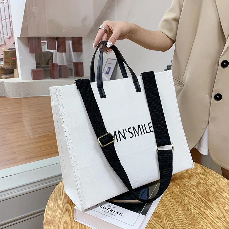 Fashion Black Canvas Tote Bags For Women Solid Handbags Girl Simple Harajuku Style Large Capacity Commuter Messenger Bag Purse 
Fashion Black Canvas Tote Bags For Women Solid Handbags Girl Simple Harajuku Style Large Capacity Commuter Messenger Bag Purse