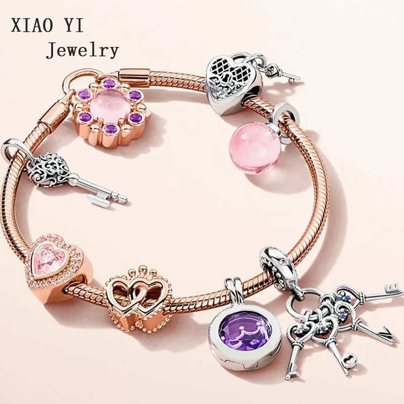 XIAOYI 100% s925 pearl crown key pendant charm rose gold pink heart key charm bracelet in various styles
XIAOYI 100% s925 pearl crown key pendant charm rose gold pink heart key charm bracelet in various styles