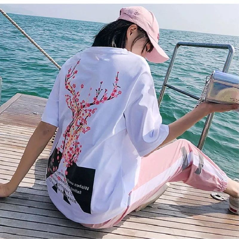 Two Piece Set Women Fashion Sport Casual Suit Flower Letter Print Top+Print Elastic Waist Long Pants Summer Tracksuit Female
Two Piece Set Women Fashion Sport Casual Suit Flower Letter Print Top+Print Elastic Waist Long Pants Summer Tracksuit Female