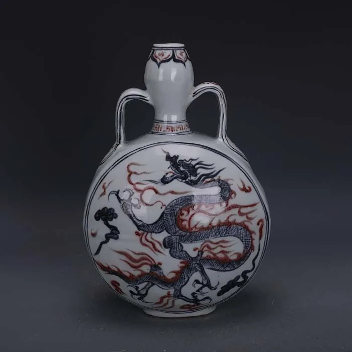 Ming Hongwu голубая и белая глянцевая плоская ваза с изображением красного дракона и Луны
Ming Hongwu голубая и белая глянцевая плоская ваза с изображением красного дракона и Луны
