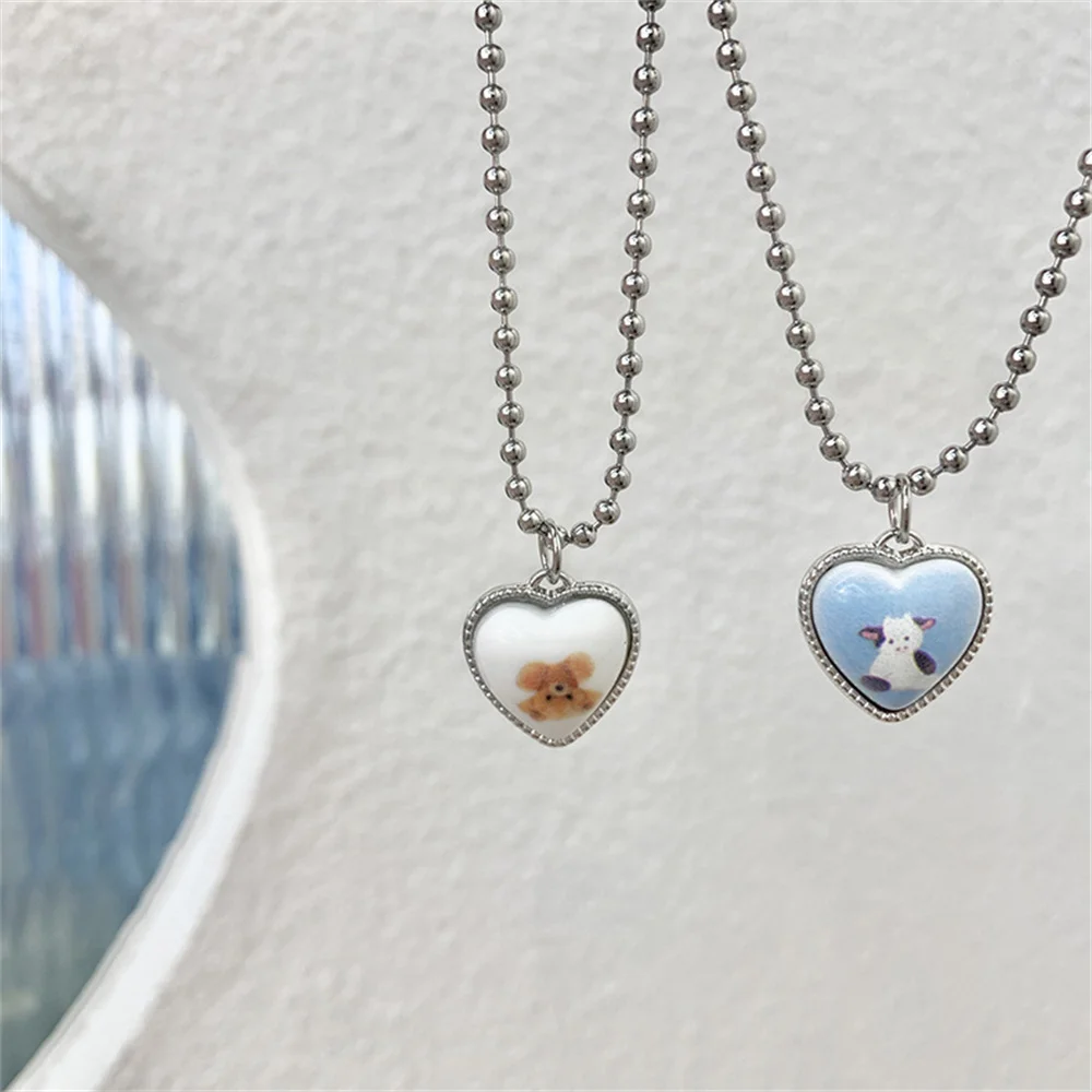 ZN Cute Bear Cows Sweater Heart Pendant Necklace For Women Beaded Chain Necklace Kawaii Collar Couple Fashion Jewelry Gift
ZN Cute Bear Cows Sweater Heart Pendant Necklace For Women Beaded Chain Necklace Kawaii Collar Couple Fashion Jewelry Gift