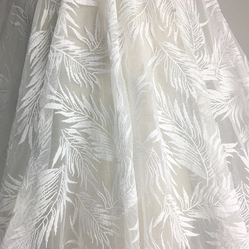 one meter Quality gauze tissus Feather embroidery fabric High grade dress wedding dress DIY material
one meter Quality gauze tissus Feather embroidery fabric High grade dress wedding dress DIY material