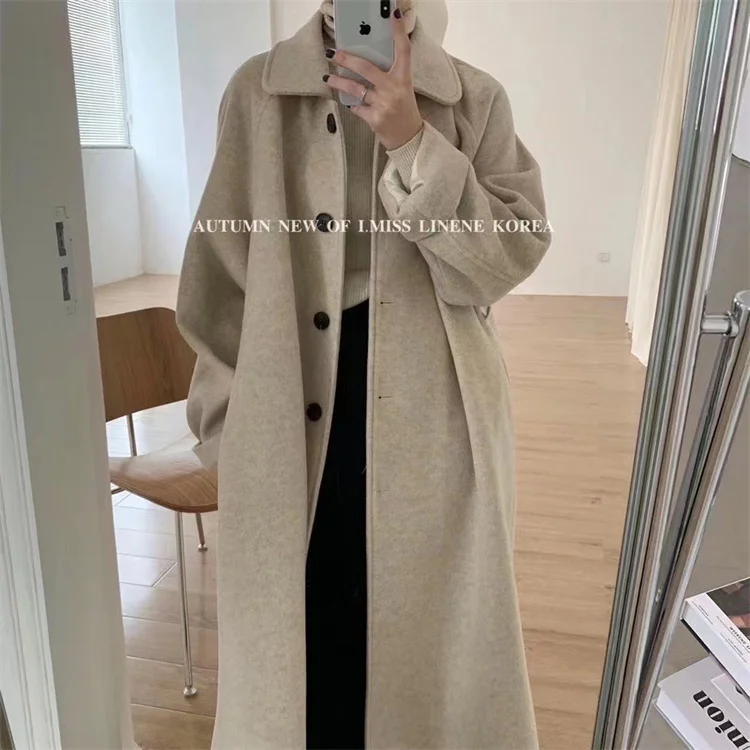 Длинное зимнее пальто, шерстяное пальто, женское новое зимнее темпераментное однобортное кашемировое пальто с лацканами, 2021 
Длинное зимнее пальто, шерстяное пальто, женское новое зимнее темпераментное однобортное кашемировое пальто с лацканами, 2021