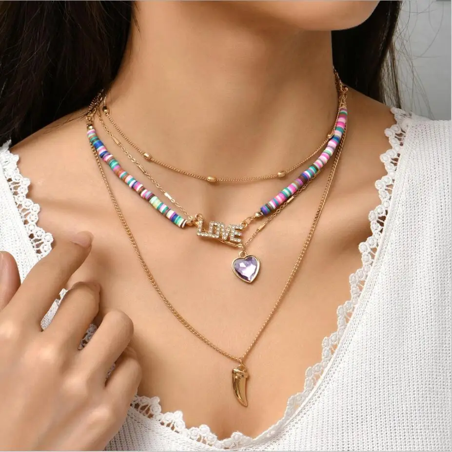 Bohemian Polymer Clay Choker Gold Color Love Letter Crystal heart Tooth Pendant Layered Necklace For Women Collier Jewelry S2235
Bohemian Polymer Clay Choker Gold Color Love Letter Crystal heart Tooth Pendant Layered Necklace For Women Collier Jewelry S2235