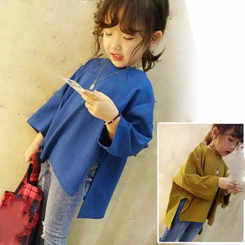 Spring girls' loose long-sleeved T-shirts children's fashion tops bottoming shirts solid color split front short back long top
Spring girls' loose long-sleeved T-shirts children's fashion tops bottoming shirts solid color split front short back long top