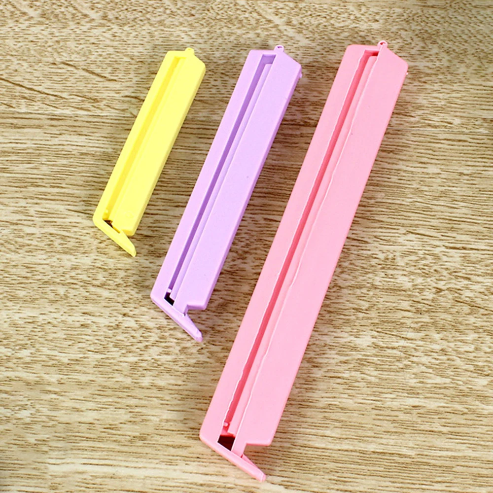 12pc/lot 3 Sizes Househould Food Snack Storage Seal Sealing Bag Clips Sealer Clamp Food Bag Clips Kitchen Tool
12pc/lot 3 Sizes Househould Food Snack Storage Seal Sealing Bag Clips Sealer Clamp Food Bag Clips Kitchen Tool
