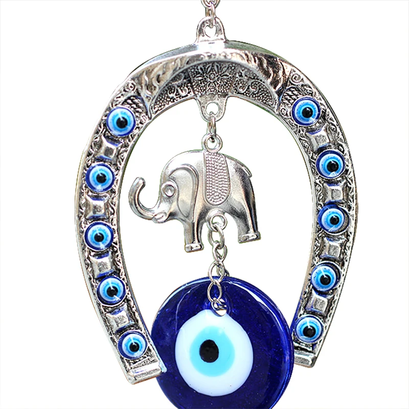 Turkish Blue Eye Horseshoe with Elephant and Ribbon Wall Hanging Amulet Ethnic Lucky Gift Pendants Home Car Hanging Decorations
Turkish Blue Eye Horseshoe with Elephant and Ribbon Wall Hanging Amulet Ethnic Lucky Gift Pendants Home Car Hanging Decorations