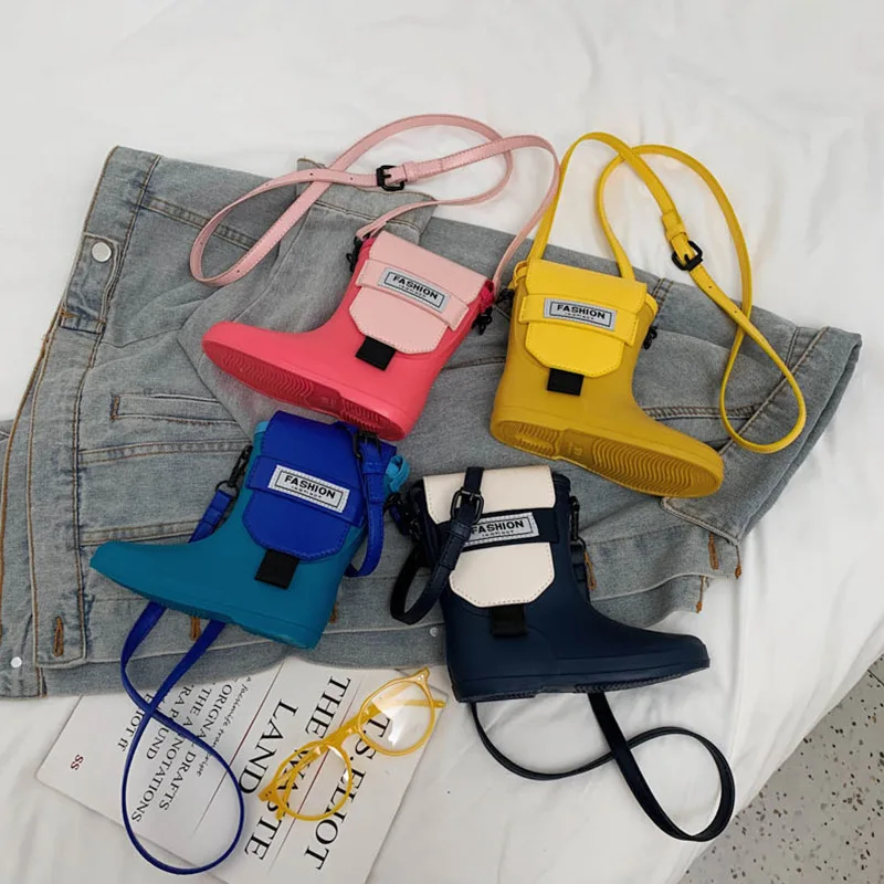 New Rain Boots Mobile Phone Bag Personality Fashion Messenger Bag Boys and Girls Silicone Accessories Shoulder Bag
New Rain Boots Mobile Phone Bag Personality Fashion Messenger Bag Boys and Girls Silicone Accessories Shoulder Bag