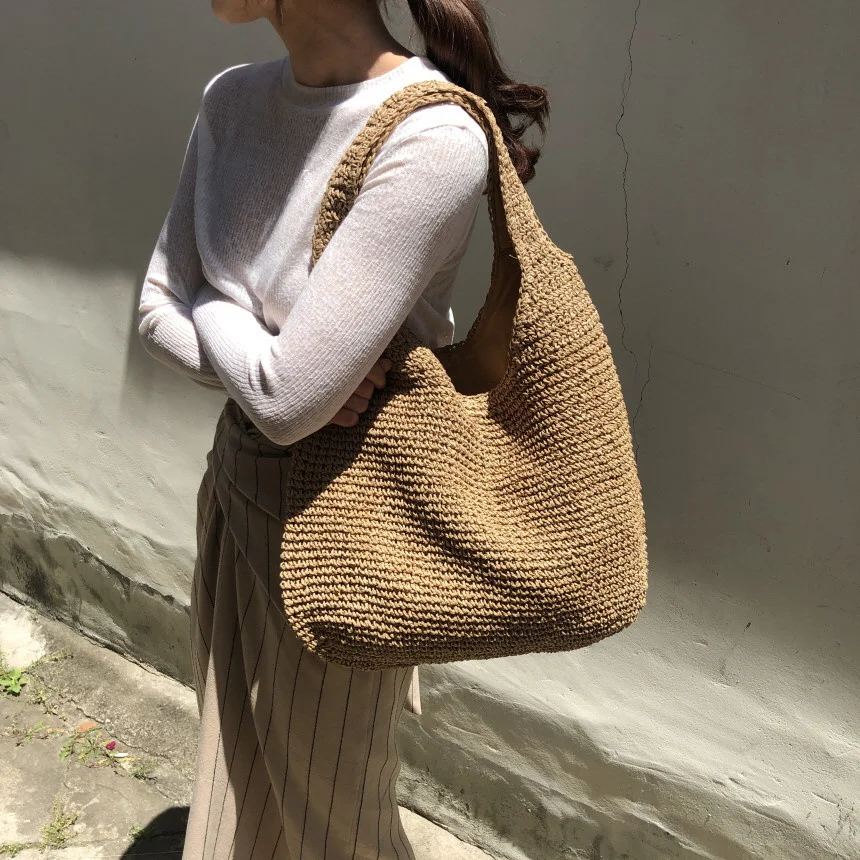 In the summer of 2021, wicker women's bag, large capacity woven handkerchief and beach straw bag
In the summer of 2021, wicker women's bag, large capacity woven handkerchief and beach straw bag
