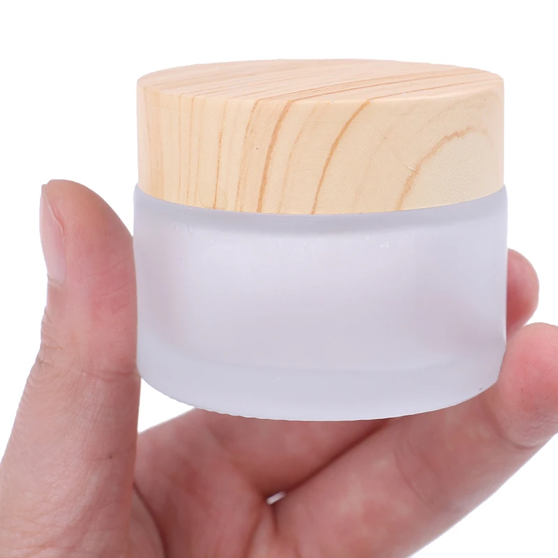 5/10/15/30/50g Refillable Bottle Glass Jar Cream Bottle Skin Care Eye Cream Jars Pot Cosmetic Container With Wood Grain Lid
5/10/15/30/50g Refillable Bottle Glass Jar Cream Bottle Skin Care Eye Cream Jars Pot Cosmetic Container With Wood Grain Lid