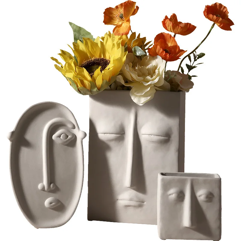 Nordic Modern Creative Ceramic Vase Simple Face Living Room Flower Arrangement Porch Art Home Decoration
Nordic Modern Creative Ceramic Vase Simple Face Living Room Flower Arrangement Porch Art Home Decoration