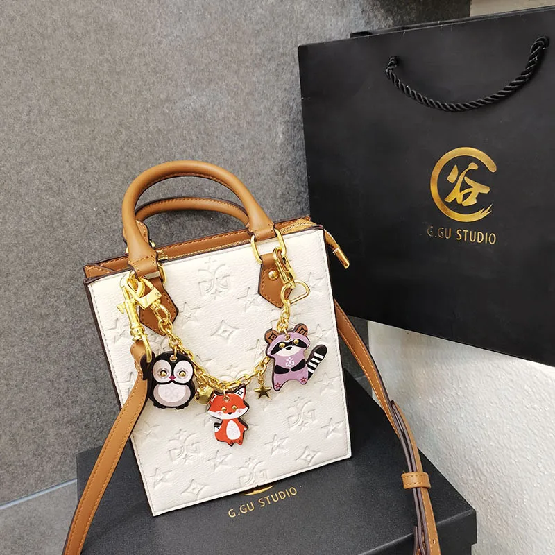 2021 New Fashion Presbyopia Embossed Horizontal Square Portable Small Tote Bag Shoulder Messenger Bag Purses and Handbags Cc Gg
2021 New Fashion Presbyopia Embossed Horizontal Square Portable Small Tote Bag Shoulder Messenger Bag Purses and Handbags Cc Gg