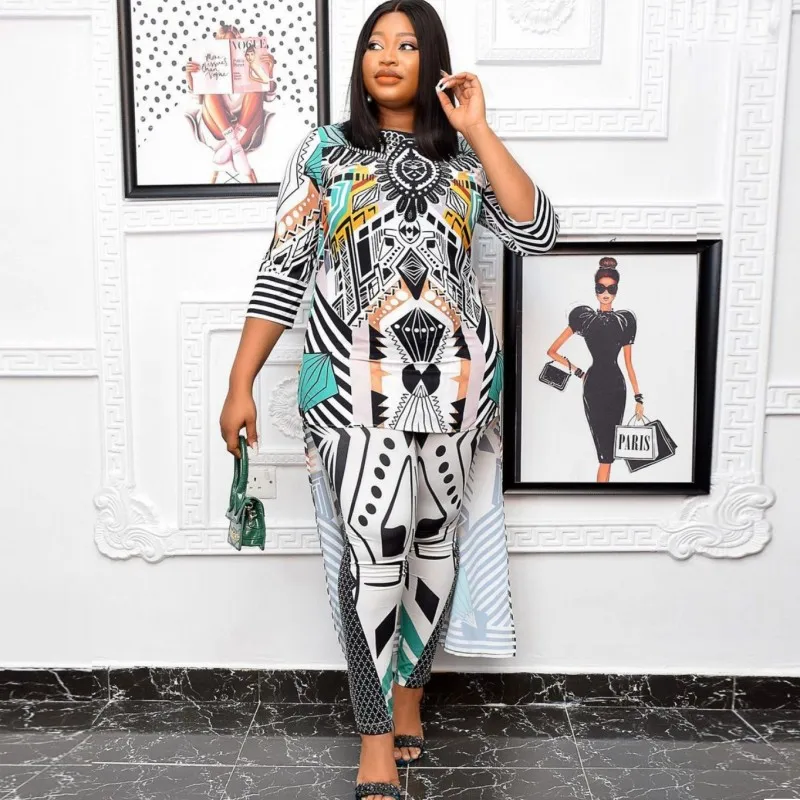 Африканская одежда для женщин, комплект из двух предметов, длинные топы и брюки с глубоким вырезом, костюмы 2021, летняя повседневная африканс... 
Африканская одежда для женщин, комплект из двух предметов, длинные топы и брюки с глубоким вырезом, костюмы 2021, летняя повседневная африканс...