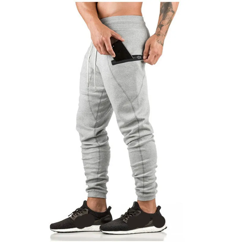 Running Pants Men Jogger Sweatpants Cotton Sportswear Sport Trousers Male Gym Fitness Pocket Jogging Skinny Track Pant 2022
Running Pants Men Jogger Sweatpants Cotton Sportswear Sport Trousers Male Gym Fitness Pocket Jogging Skinny Track Pant 2022