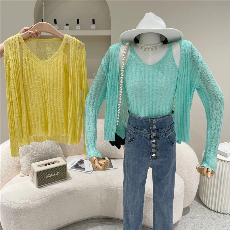 Niche Design Two Piece Set Women Spring Fashion V-neck Suspender Vest Top + Thin Coat Pit Stripe Knitted Open Sun Proof Shirt
Niche Design Two Piece Set Women Spring Fashion V-neck Suspender Vest Top + Thin Coat Pit Stripe Knitted Open Sun Proof Shirt