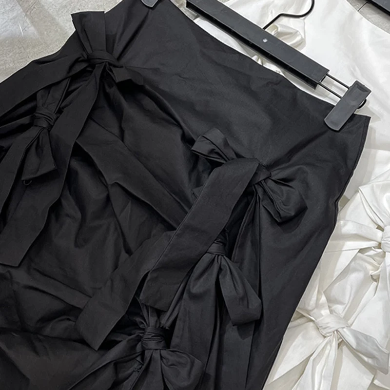TWOTWINSTYLE Black Patchwork Bowknot Skirt For Women High Waist Midi Solid Skirts Female Fashion New Clothing 2021 Spring Tide
TWOTWINSTYLE Black Patchwork Bowknot Skirt For Women High Waist Midi Solid Skirts Female Fashion New Clothing 2021 Spring Tide