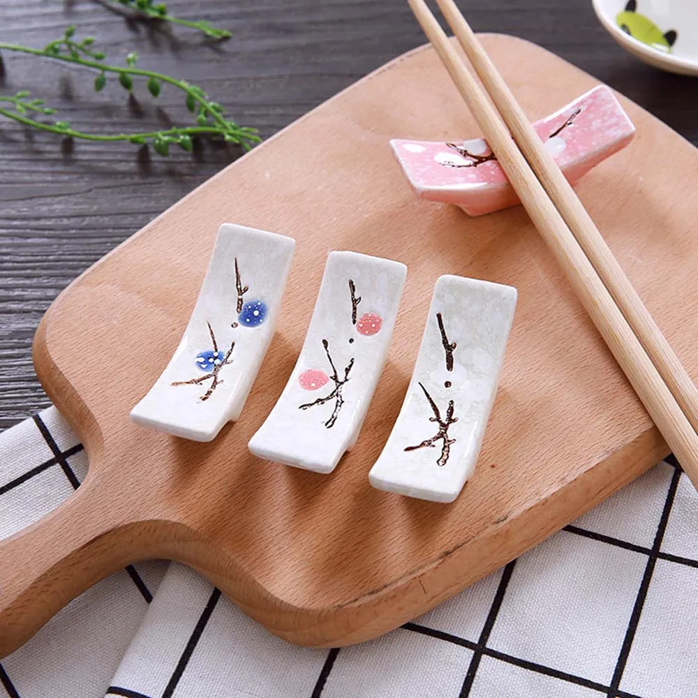 1 Pc Japanese Plum Blossom Ceramic Chopstick Holder Creative Kitchen Supplies Household Chopstick Holder Care Gadget
1 Pc Japanese Plum Blossom Ceramic Chopstick Holder Creative Kitchen Supplies Household Chopstick Holder Care Gadget