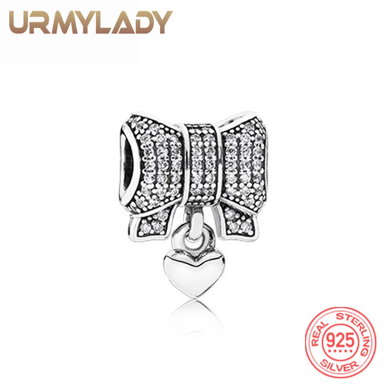 Бусина-Шарм URMYLADY из серебра 925 пробы с подвеской-бантом подходит для браслета Pandora ювелирных изделий для празднования свадьбы
Бусина-Шарм URMYLADY из серебра 925 пробы с подвеской-бантом подходит для браслета Pandora ювелирных изделий для празднования свадьбы