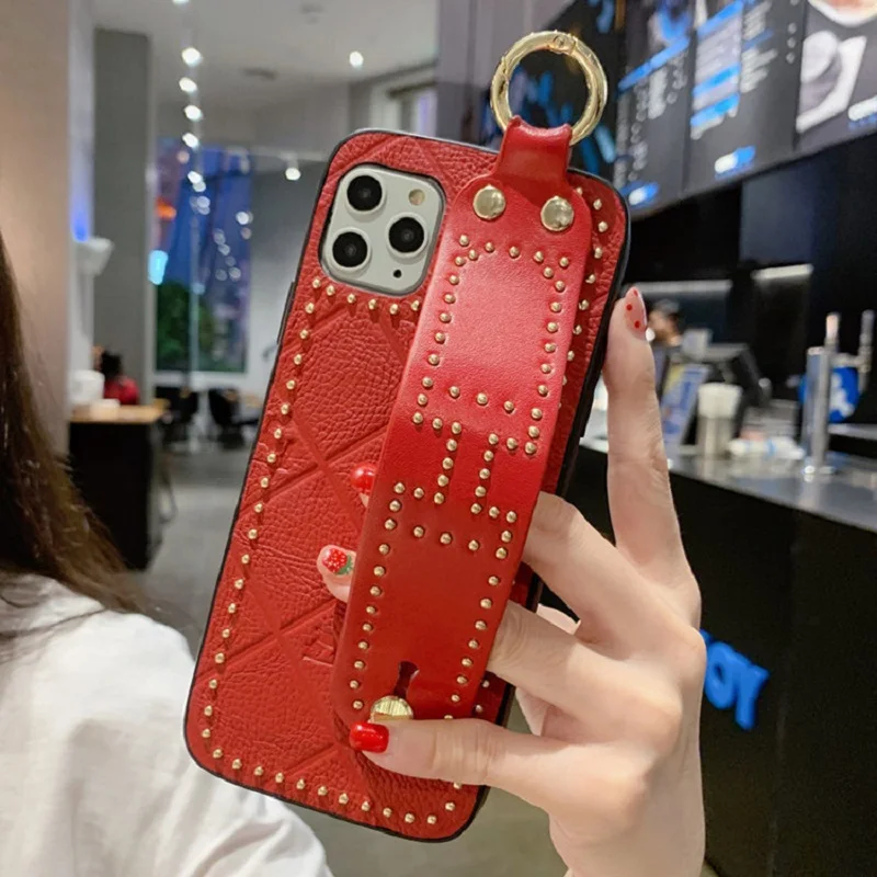 Shell European American big rivet wrist strap for iPhone XS XR XSMAX Shockproof Bumper bracket protective cover
Shell European American big rivet wrist strap for iPhone XS XR XSMAX Shockproof Bumper bracket protective cover
