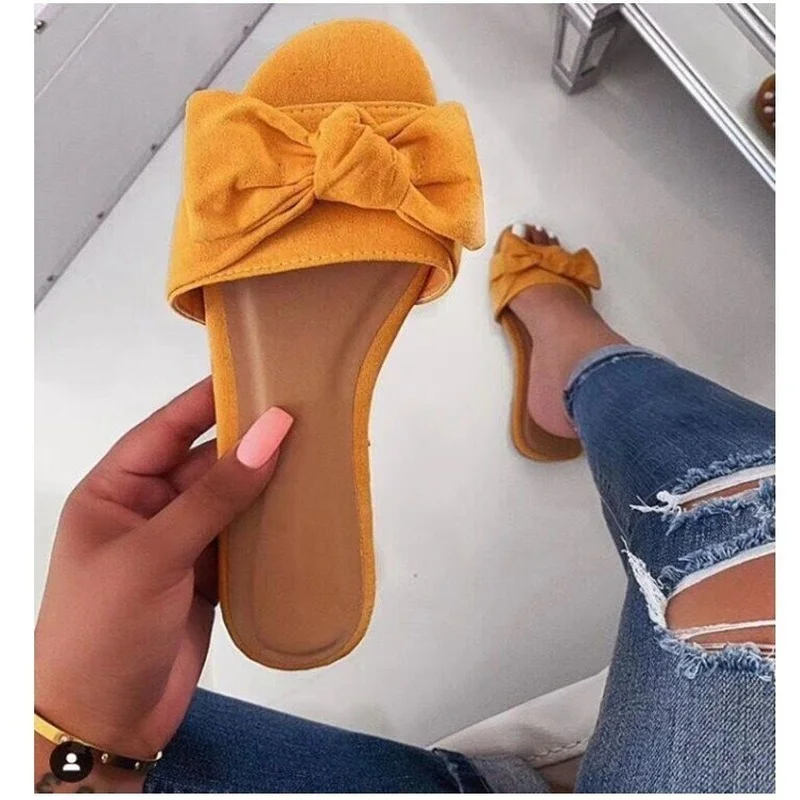 2021 Summer New Leisure Flat Bow Sandals Women's Plus Size One-word Slippers Beach Shoes 
2021 Summer New Leisure Flat Bow Sandals Women's Plus Size One-word Slippers Beach Shoes