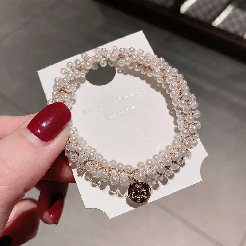 Korean headdress Pearl crystal hairband Bracelet dual purpose headband women's net red hair band
Korean headdress Pearl crystal hairband Bracelet dual purpose headband women's net red hair band