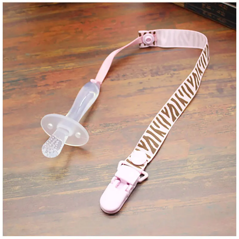 New Rattles Kids Teether Training Tooth Parcifier Chain Clip Newborn Baby Infants Dental Care Tool Nipple Clip Silicone
New Rattles Kids Teether Training Tooth Parcifier Chain Clip Newborn Baby Infants Dental Care Tool Nipple Clip Silicone