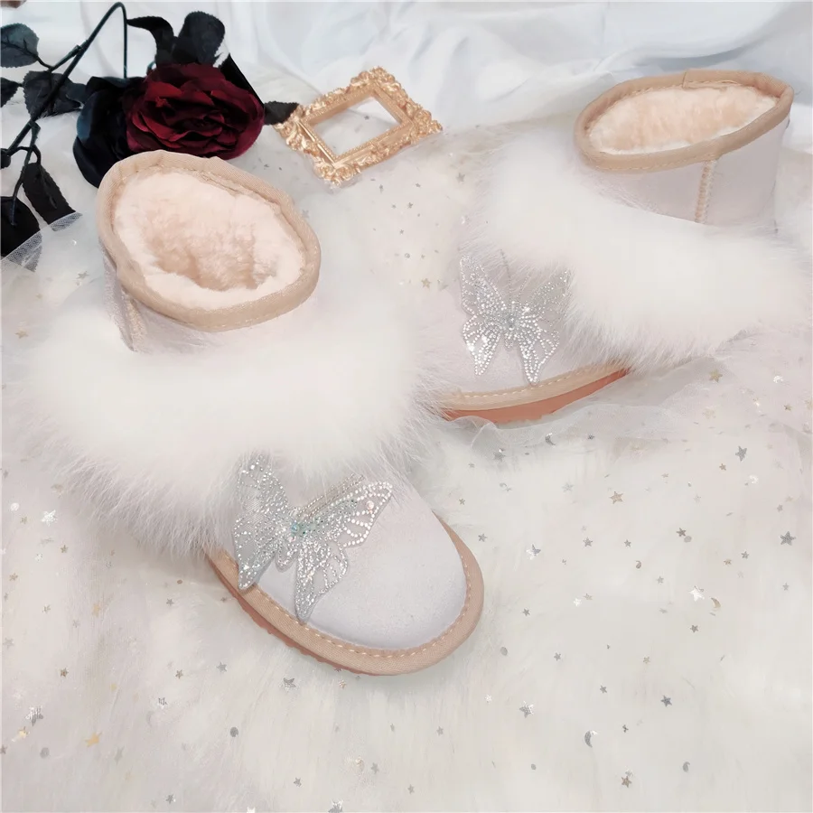 Winter thick non-slip women's white boots fox hair exquisite butterfly thick velvet short snow boots fairy style 2021
Winter thick non-slip women's white boots fox hair exquisite butterfly thick velvet short snow boots fairy style 2021