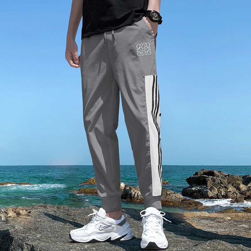 2021 Streetwear Hip hop Joggers Casual and comfortable Men's trousers Striped stitching alphabet jogging Pants Size 4XL
2021 Streetwear Hip hop Joggers Casual and comfortable Men's trousers Striped stitching alphabet jogging Pants Size 4XL