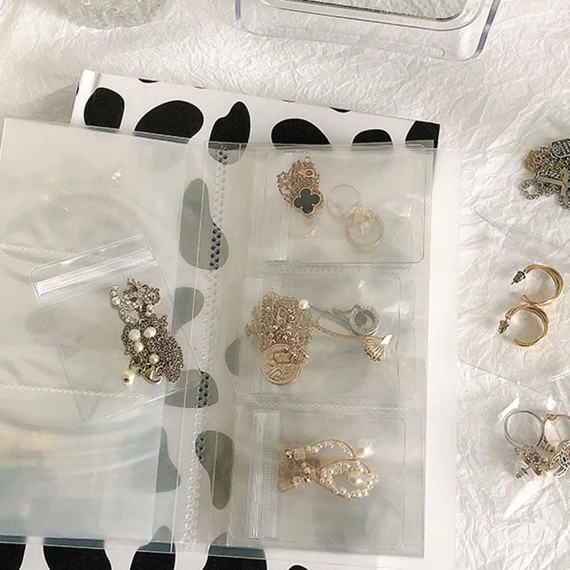 Jewelry Storage Book With 240 Card Slots Transparent Jewelry Display Organizer Earring Jewelry Storage Case with Ziplock Bag
Jewelry Storage Book With 240 Card Slots Transparent Jewelry Display Organizer Earring Jewelry Storage Case with Ziplock Bag