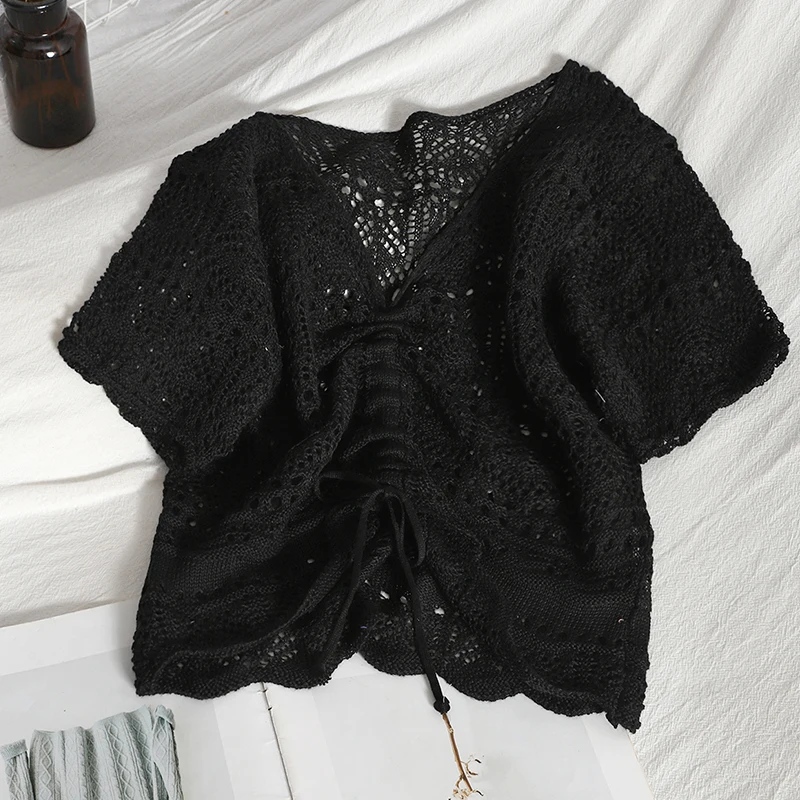 ZAWAHIKI Korean Fashion Knitted Pullover Summer V Neck Hollow Out Drawstring Bow Short Sleeve Tops Solid Short Women Clothing
ZAWAHIKI Korean Fashion Knitted Pullover Summer V Neck Hollow Out Drawstring Bow Short Sleeve Tops Solid Short Women Clothing