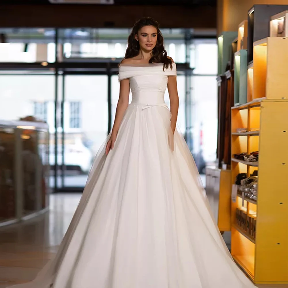 Eleglant Simple Ivory Beach Wedding Dress A-Line Tulle White Boho Off-The-Shoulder Bow Wedding Bridal Gowns 2021 robe de mariée
Eleglant Simple Ivory Beach Wedding Dress A-Line Tulle White Boho Off-The-Shoulder Bow Wedding Bridal Gowns 2021 robe de mariée