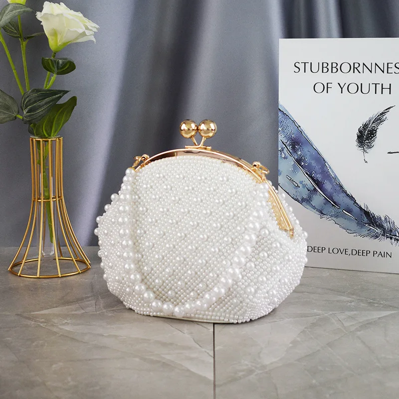 Fashion ladies evening hand bag with rich pearl crystal beads bride wedding banquet bag lady handbag high quality handbag
Fashion ladies evening hand bag with rich pearl crystal beads bride wedding banquet bag lady handbag high quality handbag