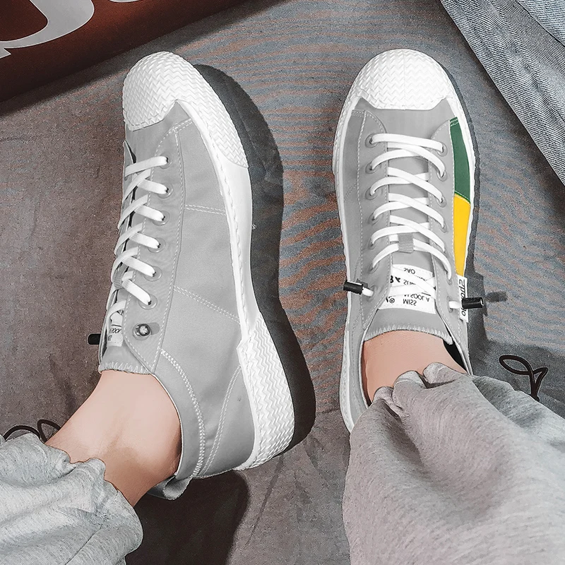 Men Shoes 2021 Korean Style Mid-Cut Canvas Calceus All-Match Vulcanized Zapato Hot Lace-Up Skateboard Scarpa Casual Schuh A36
Men Shoes 2021 Korean Style Mid-Cut Canvas Calceus All-Match Vulcanized Zapato Hot Lace-Up Skateboard Scarpa Casual Schuh A36