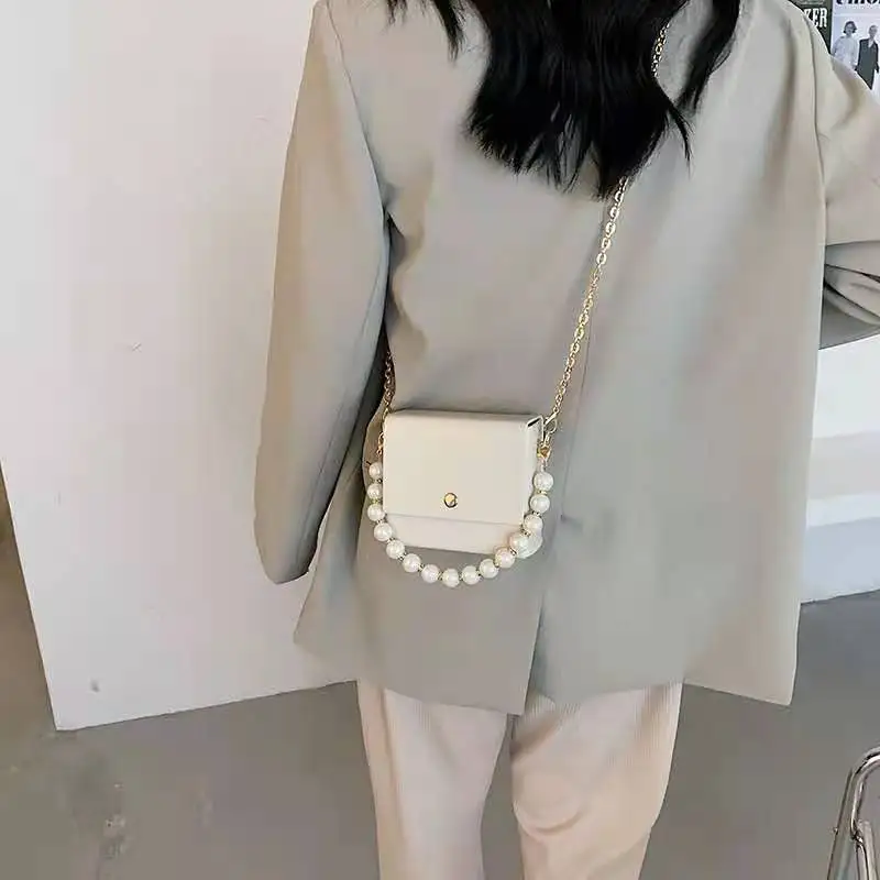 Small bag female fashion fashion fashion pearl hand chain crossbody bag
Small bag female fashion fashion fashion pearl hand chain crossbody bag