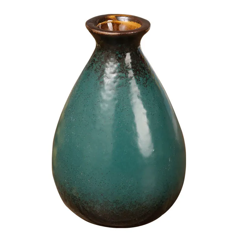 Dried kiln flower vase ceramic vase living room mini vase creative simple table decoration
Dried kiln flower vase ceramic vase living room mini vase creative simple table decoration