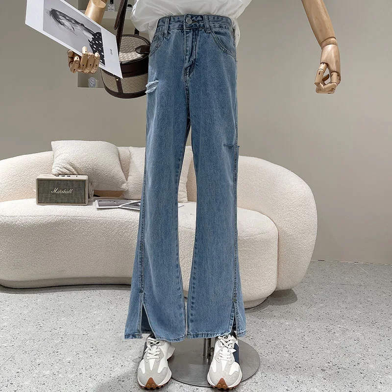 Women's Spring Summer 2021 Fashion Show thin show high retro wash water hole wide leg split long jeans
Women's Spring Summer 2021 Fashion Show thin show high retro wash water hole wide leg split long jeans