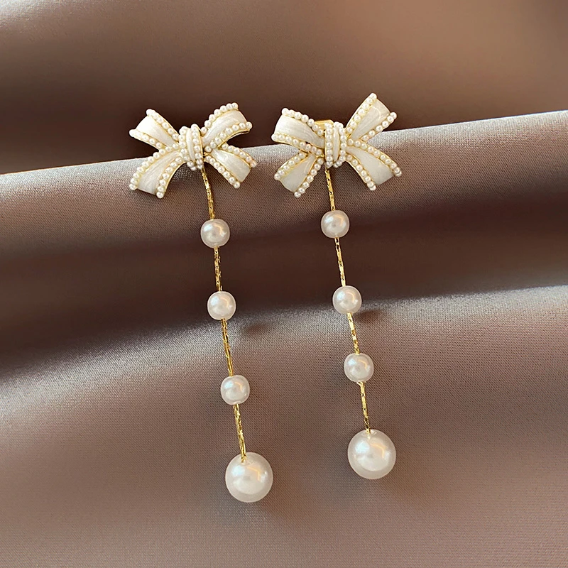 CARLIDANA 2022 Fashion Bowknot Pearls Long Tassel Earrings For Women Korean Style Delicate New Jewelry Brincos Wholesale Gift
CARLIDANA 2022 Fashion Bowknot Pearls Long Tassel Earrings For Women Korean Style Delicate New Jewelry Brincos Wholesale Gift