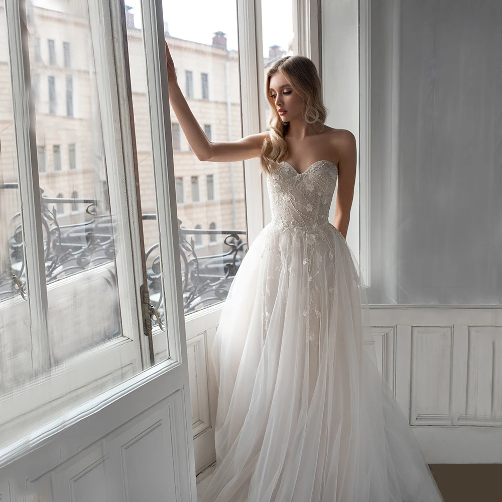 Simple Strapless Wedding Party Dresses Sweetheart A Line Tulle Applique Engagement Sweep Train Bride Gown Свадебное платье 2021
Simple Strapless Wedding Party Dresses Sweetheart A Line Tulle Applique Engagement Sweep Train Bride Gown Свадебное платье 2021